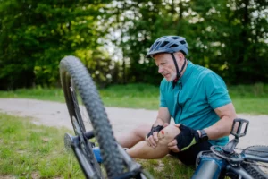 man on ground after bike crash